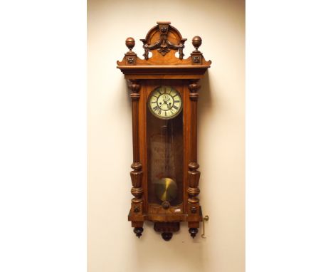 Victorian Vienna striking wall clock in walnut and glazed case 