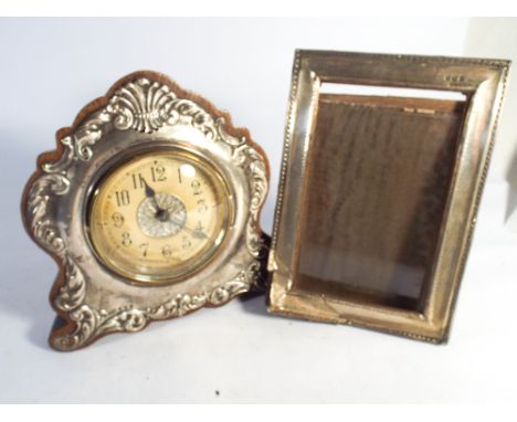 British United Clock Company silver mounted easel mantel clock and a hallmarked silver frame as found 