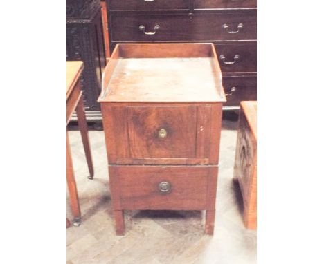 A Georgian mahogany commode made into a cupboard with drawer with tray top