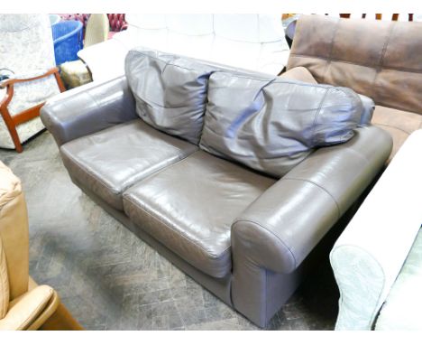 Chocolate brown faux leather 2 seater sofa and a cream leather footstool 