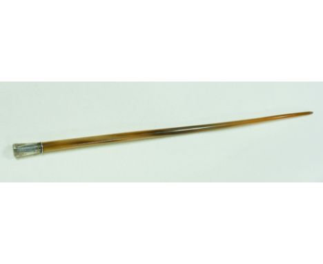 A Victorian worked Rhino horn ladies walking cane with silver top,  Length 54cm        slight bending but overall good condit