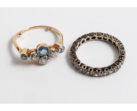 Edwardian 5 stone diamond and single stone aquamarine dress ring, ring size 'K' together with a full stone set eternity ring,