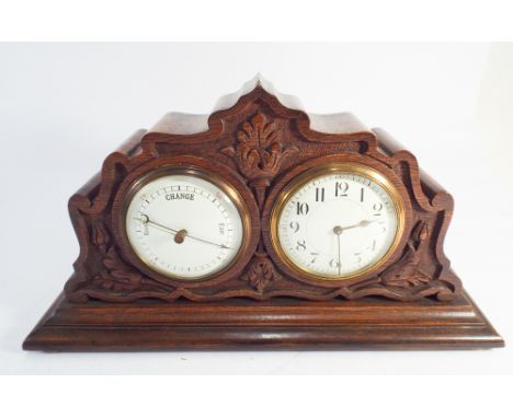 1920s clock and barometer in carved oak case 