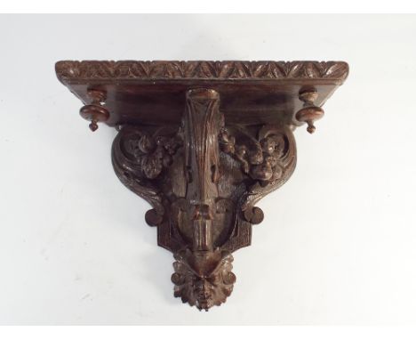 Carved oak wall bracket 