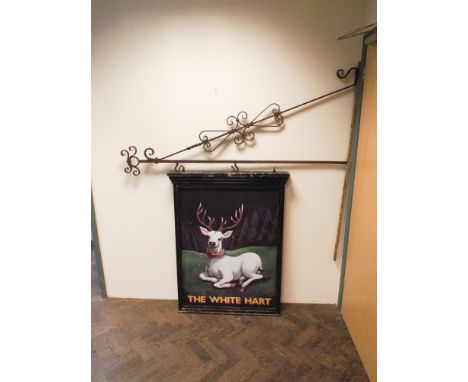 Old 'White Hart' pub hanging sign, with wrought iron wall bracket