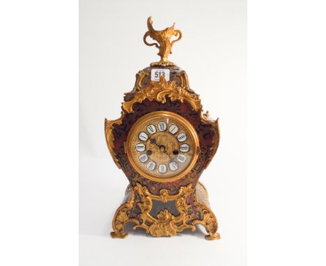 A 20th century copy of a French early 19th century Boule clock complete with its pendulum and key gilded and enamelled dial o