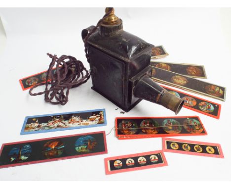 Old magic lantern and a selection of slides to include nursery rhymes, Old Mother Hubbard, Robinson Crusoe, Puss in Boots, Li