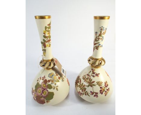 Large pair of Royal Worcester blush ivory narrow necked vases painted with wild flower sprays with pierced collars.  Height 3