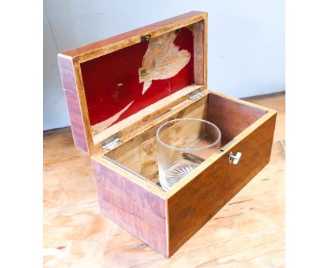 A Victorian mahogany tea caddy has the glass mixing bowl but nothing else