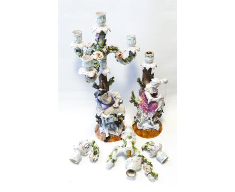 Pair of Augustus Rex Dresden flower encrusted figural candlestick table centrepieces with damage