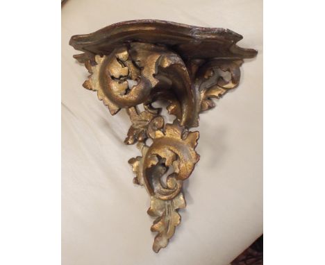 Gilt wood wall bracket in rococo style measuring 28cm wide x 31cm high 