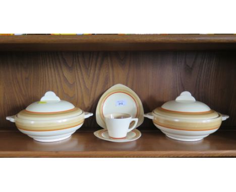 A pair of Clarice Cliff vegetable tureens, with brown and orange band decoration 26.5cm and a matching tea cup, saucer and si
