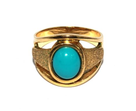 A turquoise set ring