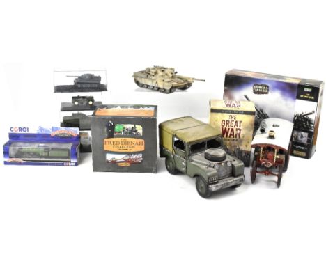 A collection of military themed collectibles to include various scale diecast military vehicles, mostly tanks and Land Rovers