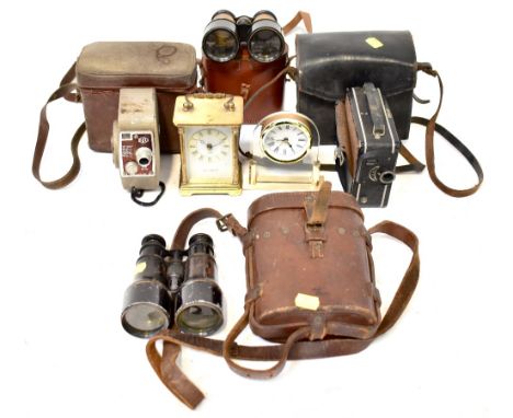 Two pairs of vintage racing binoculars in leather cases comprising a Dolland of London example and a further example, a Coron