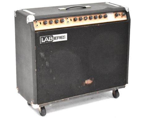 A Lab Series L5 100w amplifier (af) and an associated chrome plated stand on castors. CONDITION REPORT Sold electrically unte