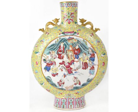 A late 19th/early 20th century large Chinese moon flask vase, the central white panel with royal figure on horseback within g