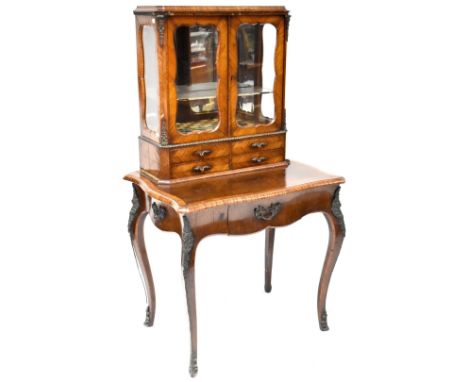 A 19th century flame mahogany bonheur du jour twin glazed display cabinet with glazed panels to either side, one interior lat