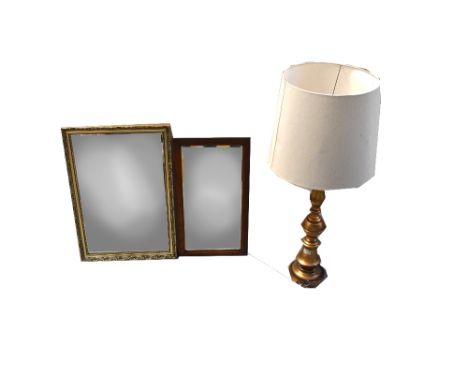 Two 20th century bevel edged mirrors, one in a gilded frame and one in an oak frame, the largest 73 x 51cm and a large decora
