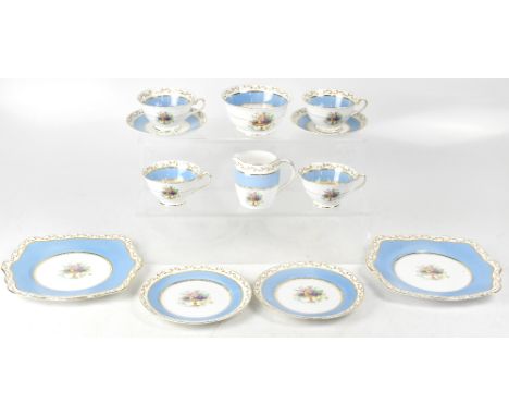 FOLEY; a fruit transfer decorated part tea service comprising twelve cups, seven saucers, twelve side plates, two bread and b