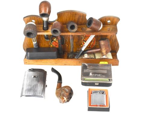 Various smoking collectibles to include an oak pipe rack  with an applied decal of a huntsman and fox, seven various pipes, i