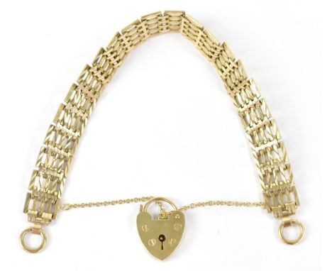 A 9ct gold five bar gate bracelet, stamped 375, with heart-shaped padlock, stamped 375, approx 15g.