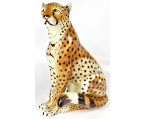 CLF FAJANCAS; a Portuguese large ceramic model of a seated cheetah, height 60cm. CONDITION REPORT Overall good condition, gru
