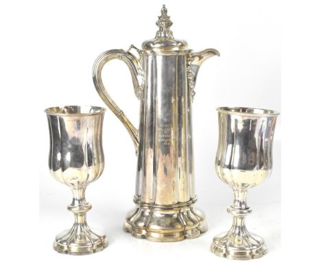 HENRY WILKINSON; a 19th century electroplated Communion engraved wine ewer of lobed form, the lid with a knop in the form of 