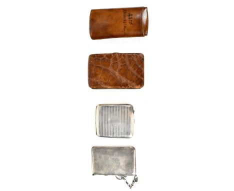 A George V hallmarked silver cigarette case with engine turned decoration front and back, Birmingham 1918, a two-piece leathe