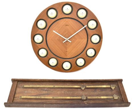 GOLFING INTEREST; a bespoke made wall clock with Acctim quartz movement, the quartered wooden dial with Penfold No1 golf ball