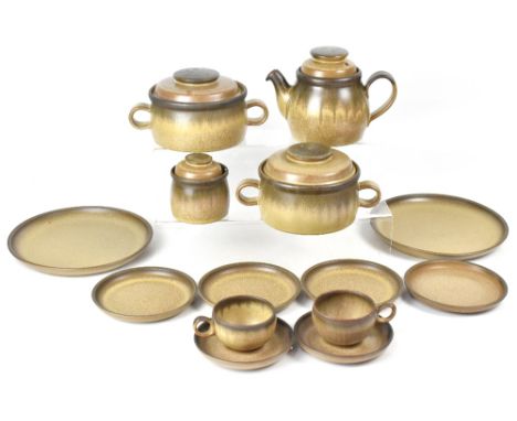 A quantity of Denby amber and brown drip glaze to include dinner plate, side plates, tureens, teapot, cups, saucers, preserve