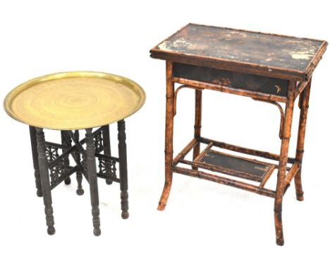 A Victorian bamboo fold-over card table top with Oriental decoration (af), lower shelf to outswept bamboo supports, when exte