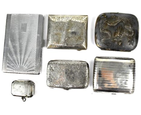 Two hallmarked silver cigarette cases with chased decoration, a hallmarked silver vesta case, various marks, approx combined 