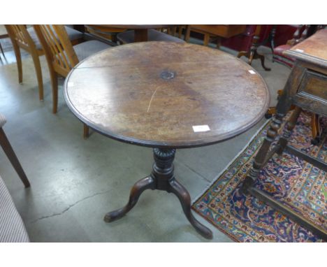 A George III Chippendale style Cuban mahogany circular tilt-top tripod tea table 