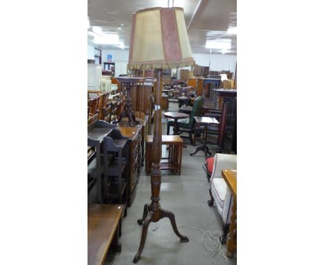 A Hepplewhite style carved mahogany floor standing lamp 