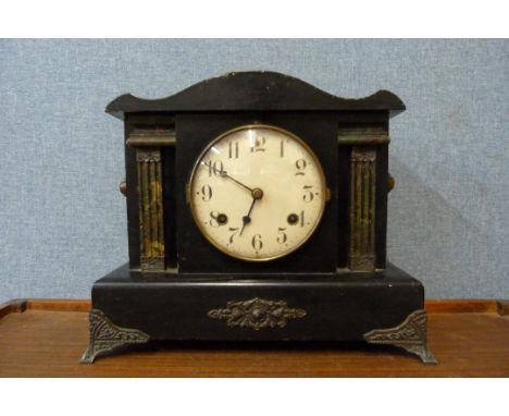 A 19th Century American Waterbury Clock Co. faux slate mantel clock 