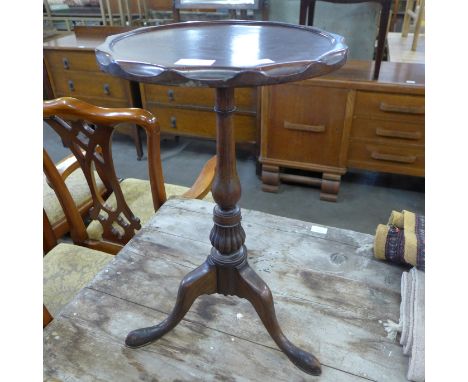 A Regency mahogany tripod wine table 