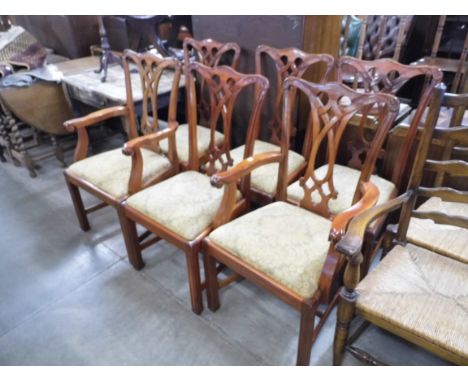 A set of six Chippendale style mahogany dining chairs 