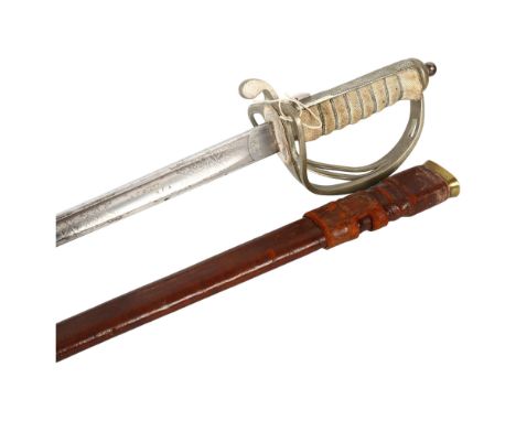 A Royal Artillery Officers sword, engraved on blade "A.C.Scott  R.F.A"  with George V cypher, in leather scabbard, overall le