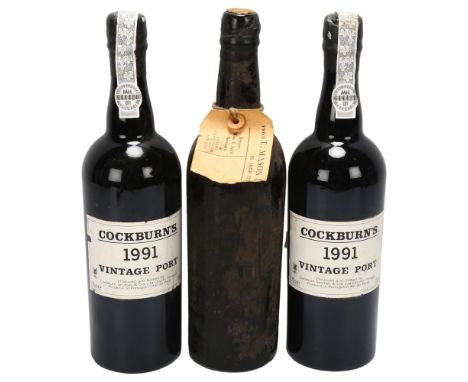 2 bottles of Cockburn's 1991 Vintage Port wine, together with another vintage bottle unmarked with merchants tag E.Mason (3)C