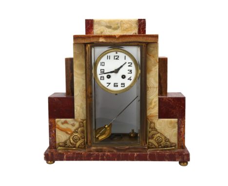 A French Art Deco multi-colour marble-cased mantel clock, with 8-day striking movement, case height 37cm, with key and pendul