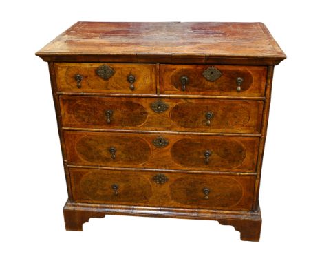 A William and Mary Period walnut chest of drawers, crossbanded top above 2 short and 3 long drawers with inlaid feather bandi