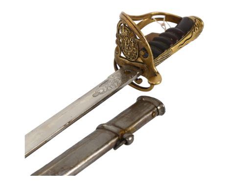 An 1845 pattern British Officers sword, Victorian cypher on Guard, leather grip and metal scabbard, probably by Thurkle, Lond