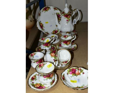 ROYAL ALBERT OLD COUNTRY ROSES PART TEA/COFFEE SERVICE, comprising a coffee pot, with stand, six tea cups and saucers, twin h