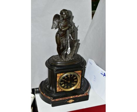 A FRENCH SLATE AND MARBLE CHIMING MANTLE CLOCK, the case surmounted with a bronzed pewter cherub, the dial has roman numeral 
