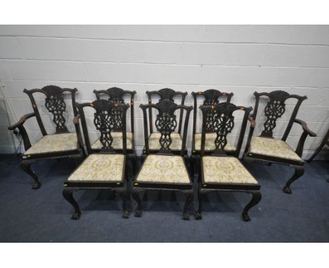 A SET OF EIGHT CHIPPENDALE STYLE MAHOGANY CHAIRS, with drop in seat pads, including two carvers (condition:- dusty finish, id