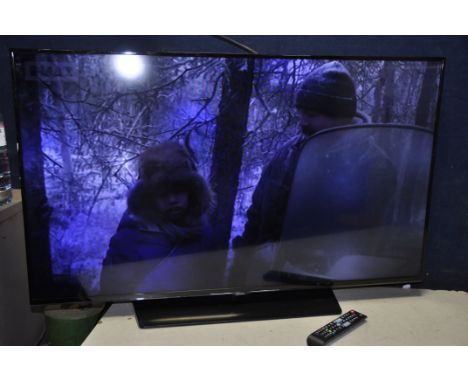 A SAMSUNG UE50H5500AK 50in TV with remote (PAT pass and working) (screen looks to have light spot doesn't affect use)