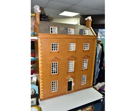 ARTHUR'S HOUSE: A LARGE HANDMADE WOODEN DOLLS HOUSE, modelled as a Georgian Town house, front opening to reveal six rooms ove