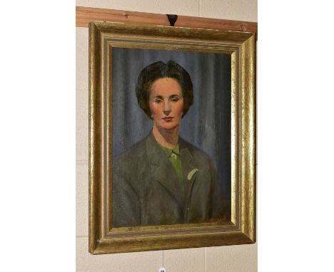 LESLIE A. WALTON (20TH CENTURY) A HEAD AND SHOULDERS PORTRAIT, the female figure is wearing a jacket with a brooch attached t