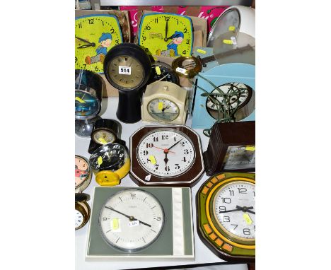 A COLLECTION OF MID 20TH CENTURY CLOCKS, to include two boxed and unused 1970's Soviet wall clock ROCT 720-50,  decorated wit